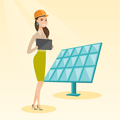 Image showing Female worker of solar power plant.