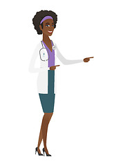 Image showing Young african-american doctor pointing to the side