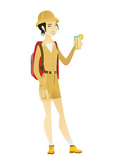 Image showing Asian traveler woman drinking cocktail.