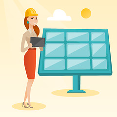 Image showing Female worker of solar power plant.