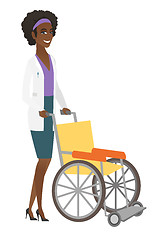 Image showing African-american doctor pushing empty wheelchair.