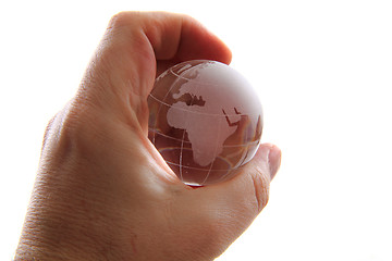 Image showing glass earth globe in human hand