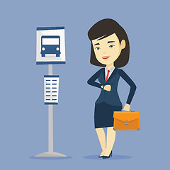 Image showing Woman waiting at the bus stop vector illustration.