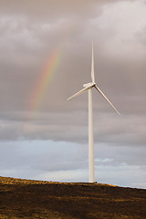 Image showing Wind Turbine Green Energy Rain Weather Rainbow 