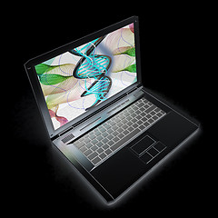 Image showing Laptop with dna medical model background on laptop screen. 3d il