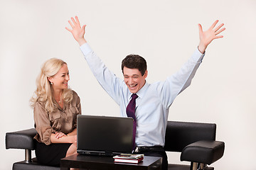 Image showing Young Woman And Man with a notebook