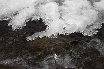 Image showing Mountain stream and figured ice crust