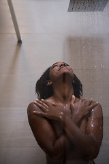 Image showing African American woman in the shower