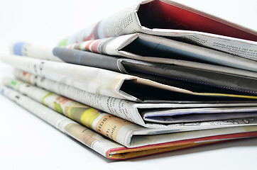 Image showing Newspapers folded and stacked 