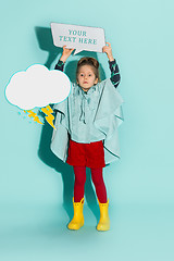 Image showing Little girl posing in fashion style wearing autumn clothing.