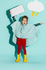 Image showing Little girl posing in fashion style wearing autumn clothing.