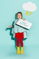 Image showing Little girl posing in fashion style wearing autumn clothing.