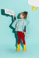 Image showing Little girl posing in fashion style wearing autumn clothing.