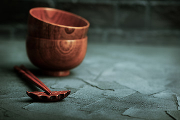 Image showing wood bowl with wooden chopsticks