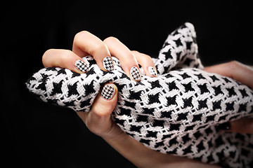Image showing Chanel grille on the nails, black and white manicure