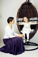 Image showing young mother with daughter at luxury home interior vintage