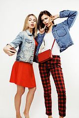 Image showing best friends teenage girls together having fun, posing emotional on white background, besties happy smiling, lifestyle people concept