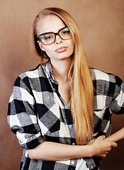 Image showing young happy smiling hipster blond girl with backpack ready to sc