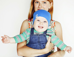 Image showing young beauty mother with cute baby, red head happy modern family