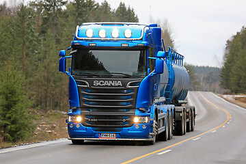 Image showing Blue Scania R580 Tank Truck Headlights on Rural Road