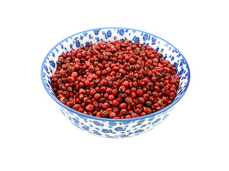 Image showing Pink peppercorns in a china bowl 