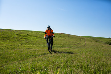 Image showing Cyclist on the Beautiful Meadow Trail