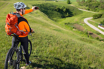 Image showing Cyclist on the Beautiful Meadow Trail