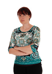 Image showing Serious woman standing waist up.