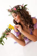 Image showing Young Woman With Flower Garland