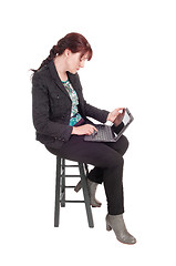 Image showing Woman working with her tablet.