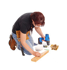 Image showing Woman working with tools.