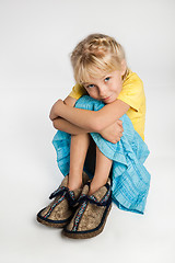 Image showing Pretty Little Girl In Big Shoes