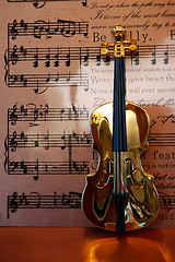 Image showing Golden Violin and Music