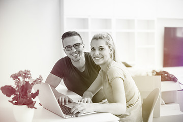 Image showing Young couple moving in a new home