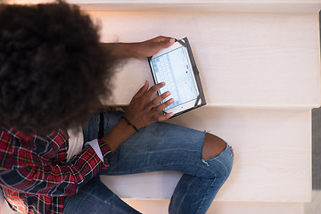 Image showing black woman using her electronic tablet