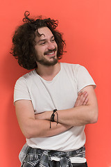 Image showing young man with funny hair over color background