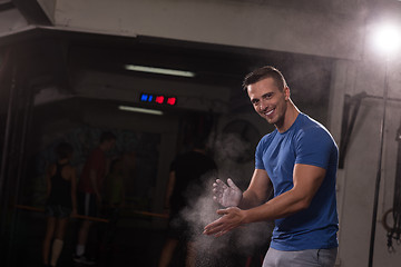 Image showing Gym Chalk Magnesium Carbonate hands clapping man