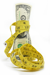 Image showing One dollars US money in measuring tape