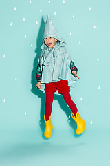 Image showing Little girl posing in fashion style wearing autumn clothing.