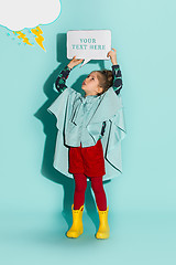 Image showing Little girl posing in fashion style wearing autumn clothing.