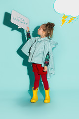 Image showing Little girl posing in fashion style wearing autumn clothing.