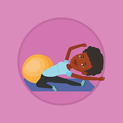 Image showing Young woman exercising with fitball.