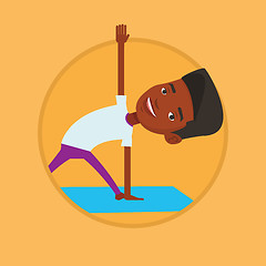 Image showing Man practicing yoga triangle pose.