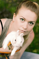 Image showing girl with her white rabbit