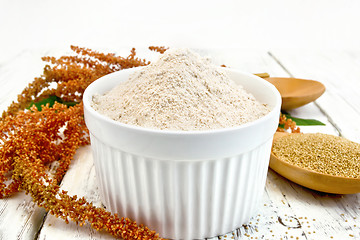 Image showing Flour amaranth in white bowl with spoon on board