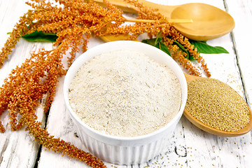 Image showing Flour amaranth in white bowl with spoon on light board