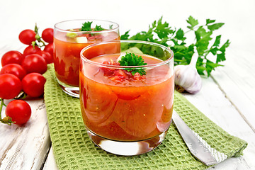 Image showing Soup tomato in two glasses on light board