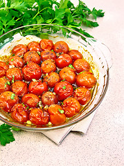 Image showing Tomatoes baked in pan on table
