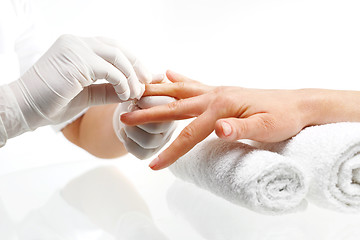 Image showing Nail polish remover, manicure Removal of nail varnish. manicure