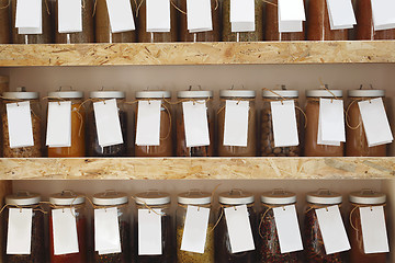 Image showing Shop with spices weight. Spices on the shelf. 